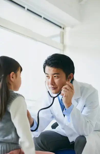 doctor-checking-health-of-little-girl